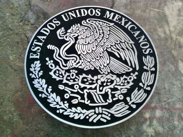 escudo en aluminio Fundido